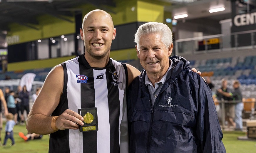 Port Macquarie’s Kyle Bray receives the 2019 Brian Saville Medal from Brian.