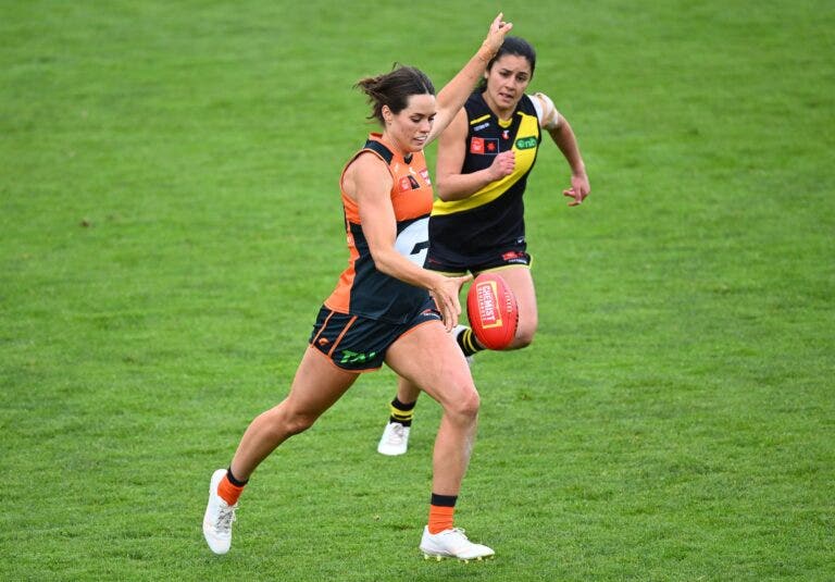 Cambridge McCormick of the Giants kicks against Richmond. Photo: Quinn Rooney/Getty Images (via AFL Photos)
