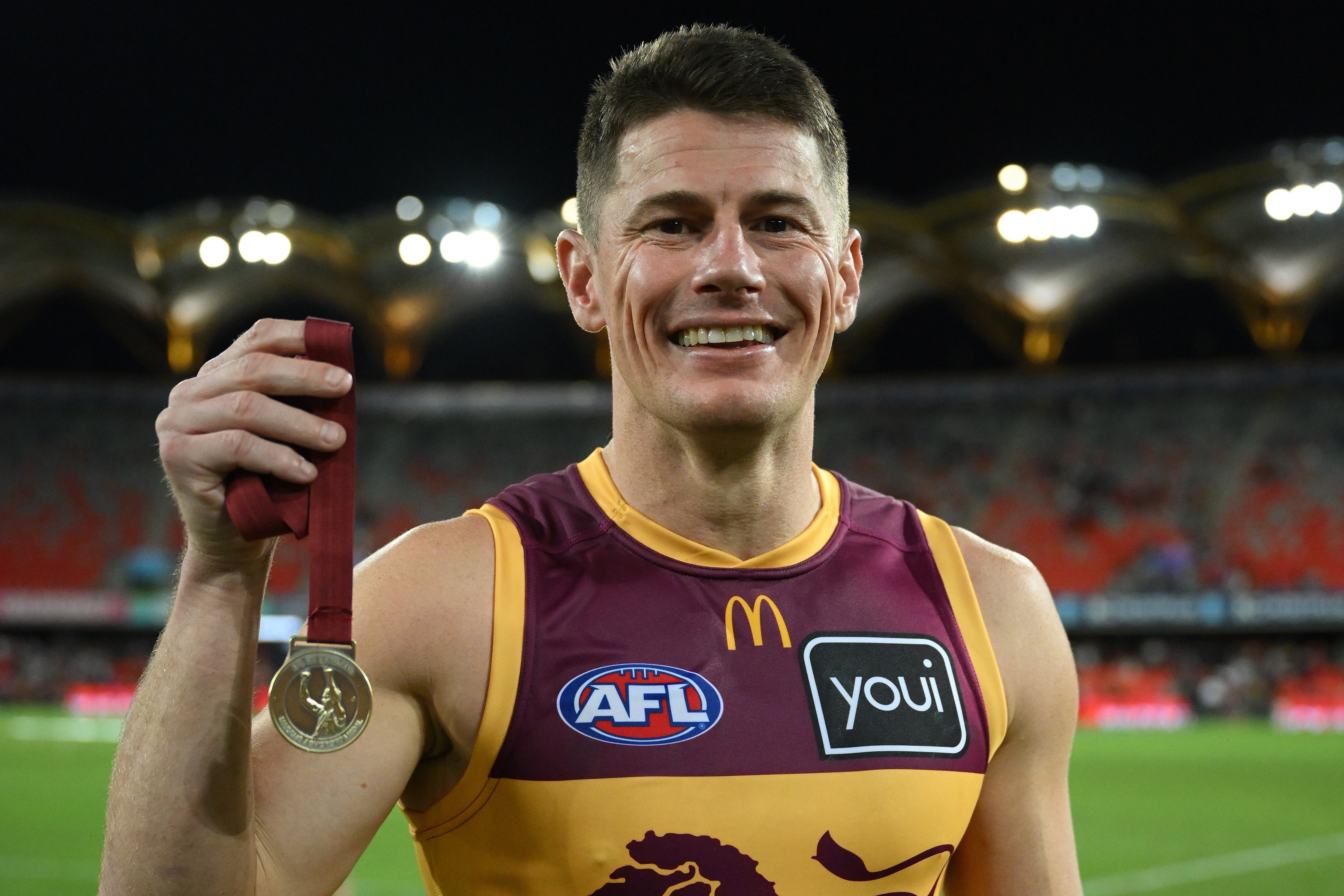 Dayne Zorko with Marcus Ashcroft Medal
