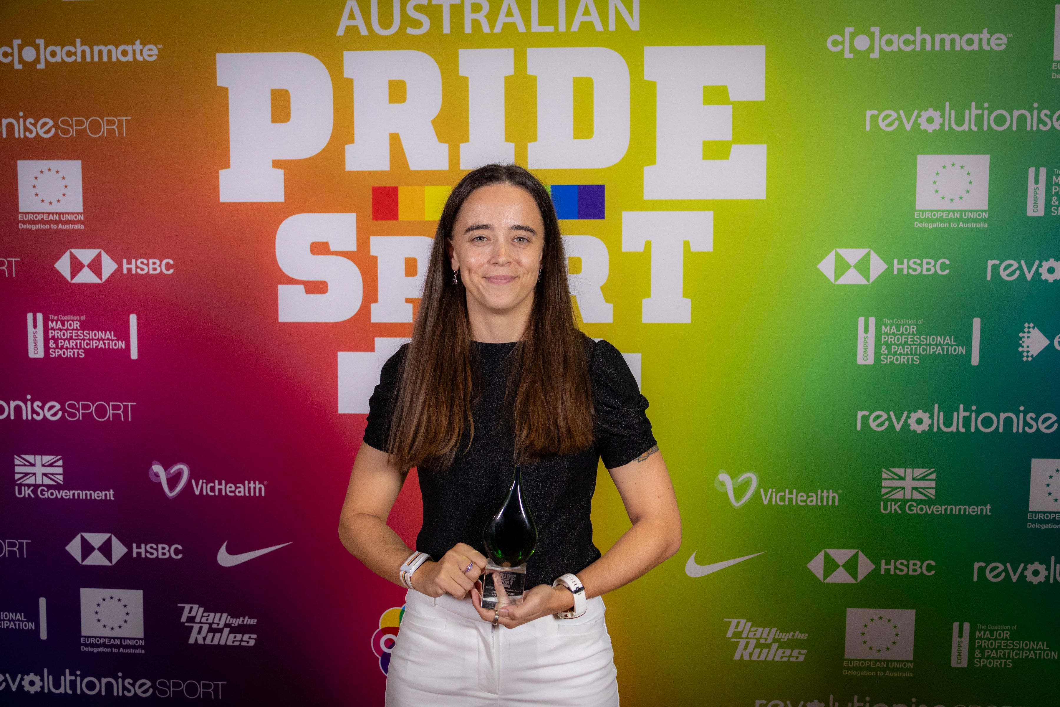 Madi Crowley-Long accepts the AFLQ award