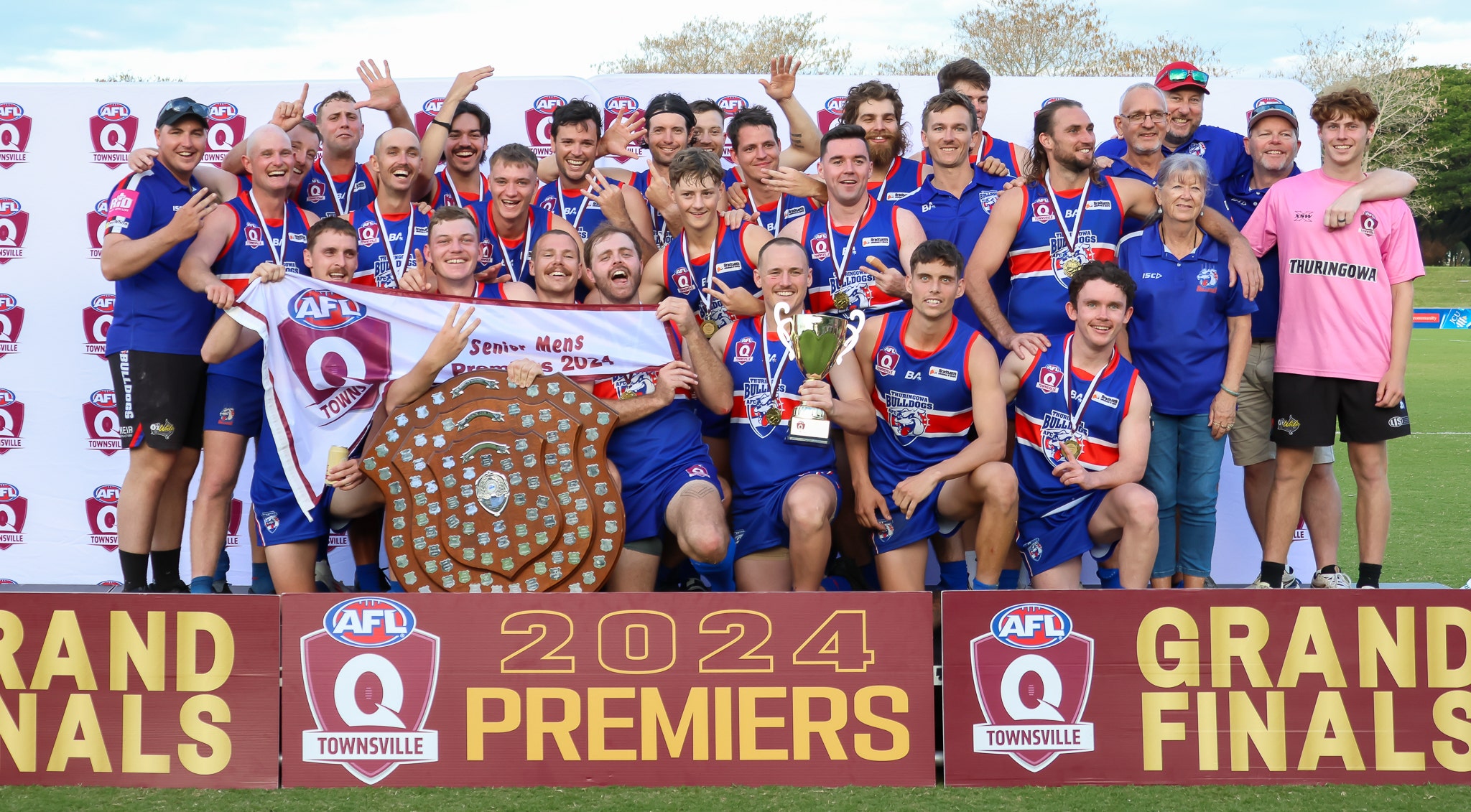 Players celebrate winning grand final