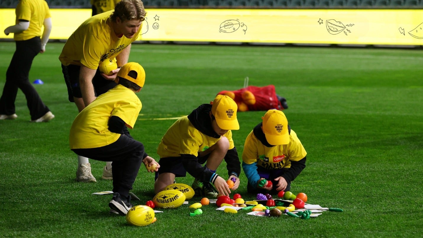 Participating in a Coles Healthy Kicks activity