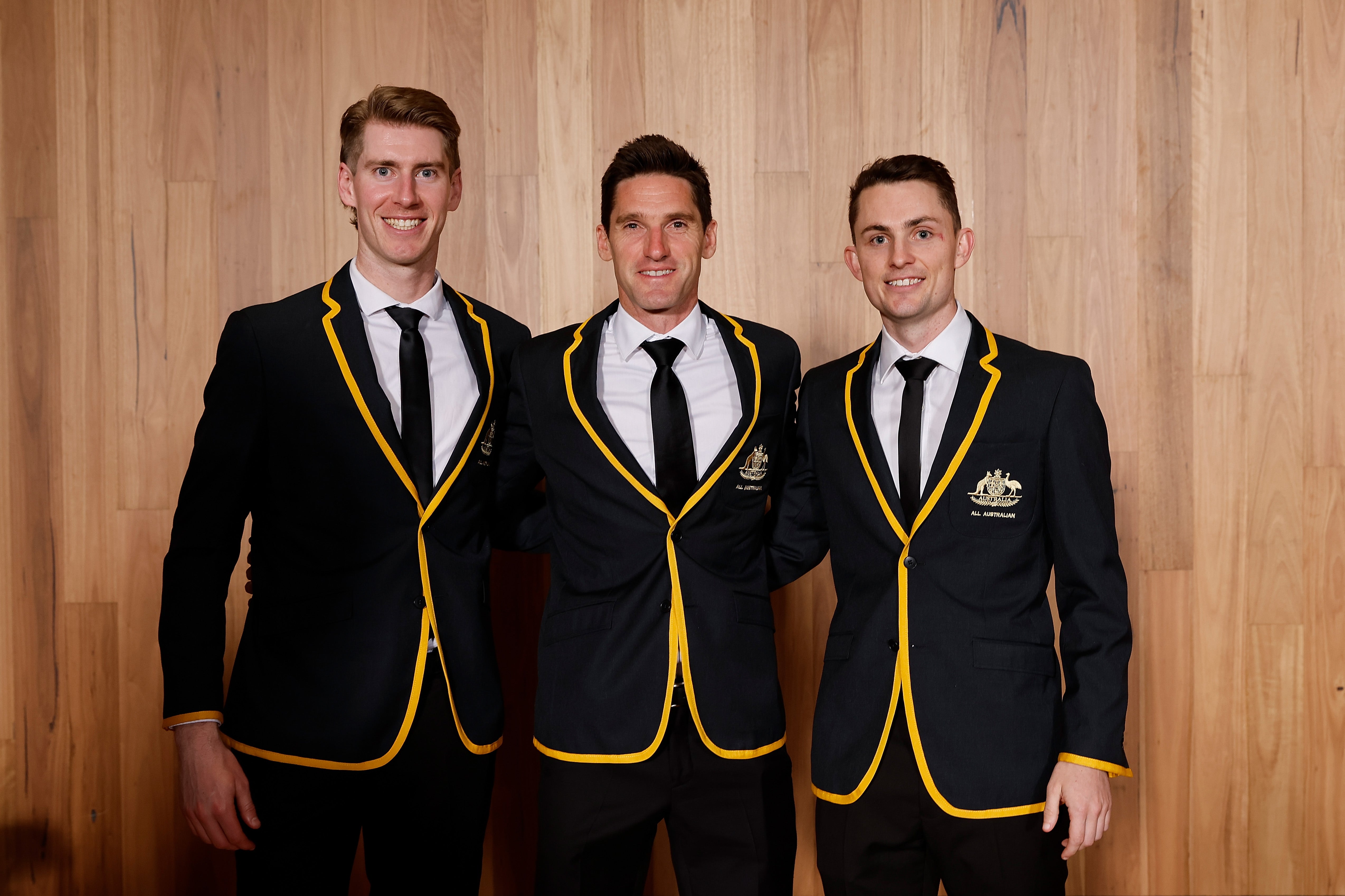 All Australian Umpires Matthew Dervan, Matt Stevic and Michael Barlow pose for a photo during the 2024 AFL Awards at Centrepiece on August 29, 2024 in Melbourne